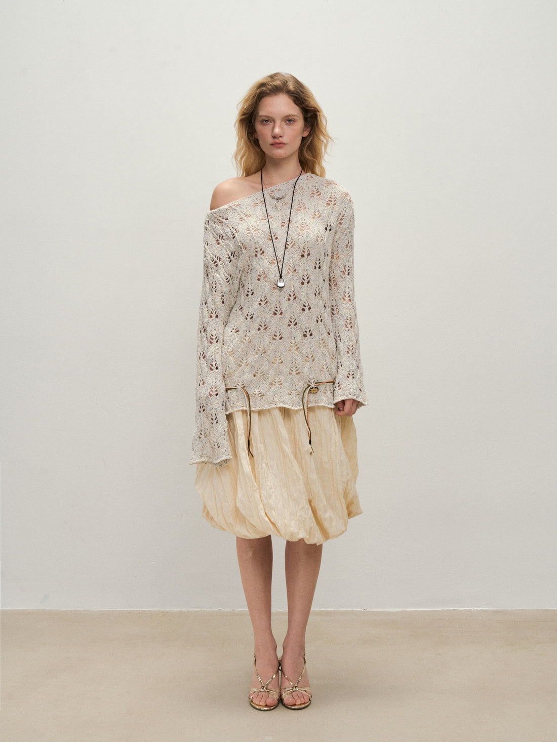 Dpercent 25SS A half-length skirt with slanted-cut and distorted texture structure